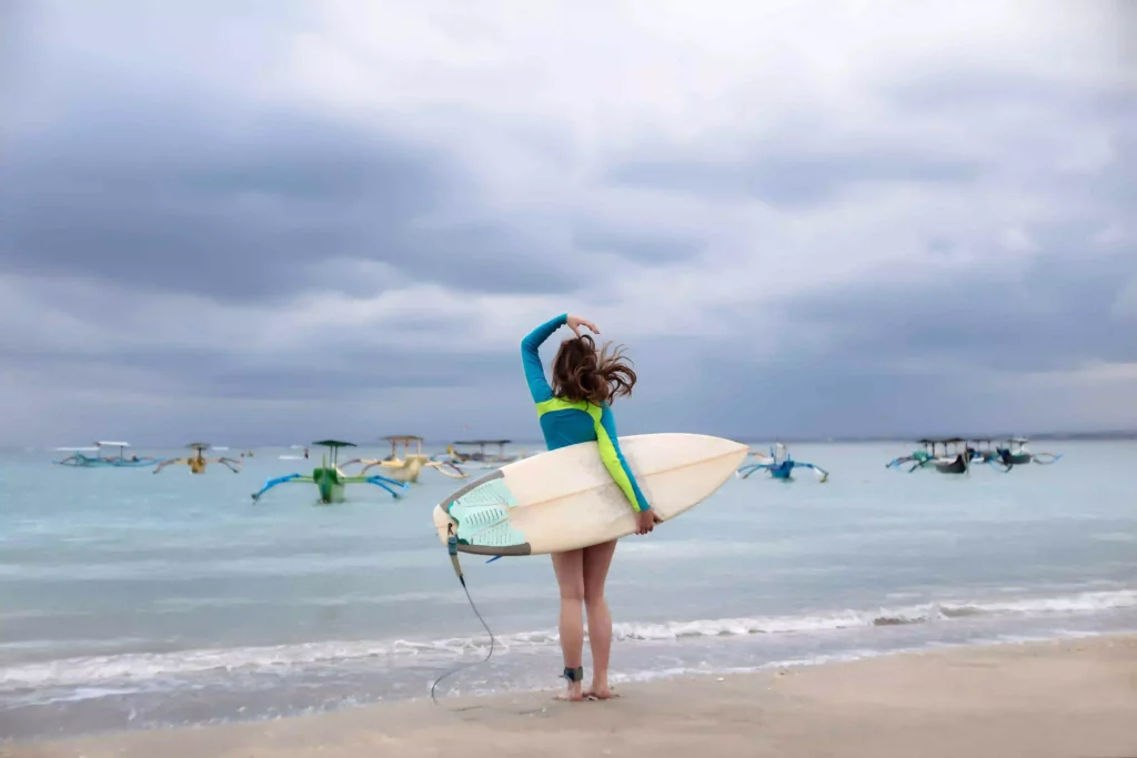 indonesia bali young woman with surf board 2022 03 08 01 25 29 utc